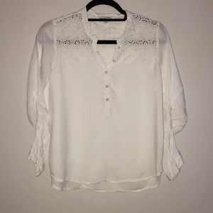 White buttoned up shirt with detailed top